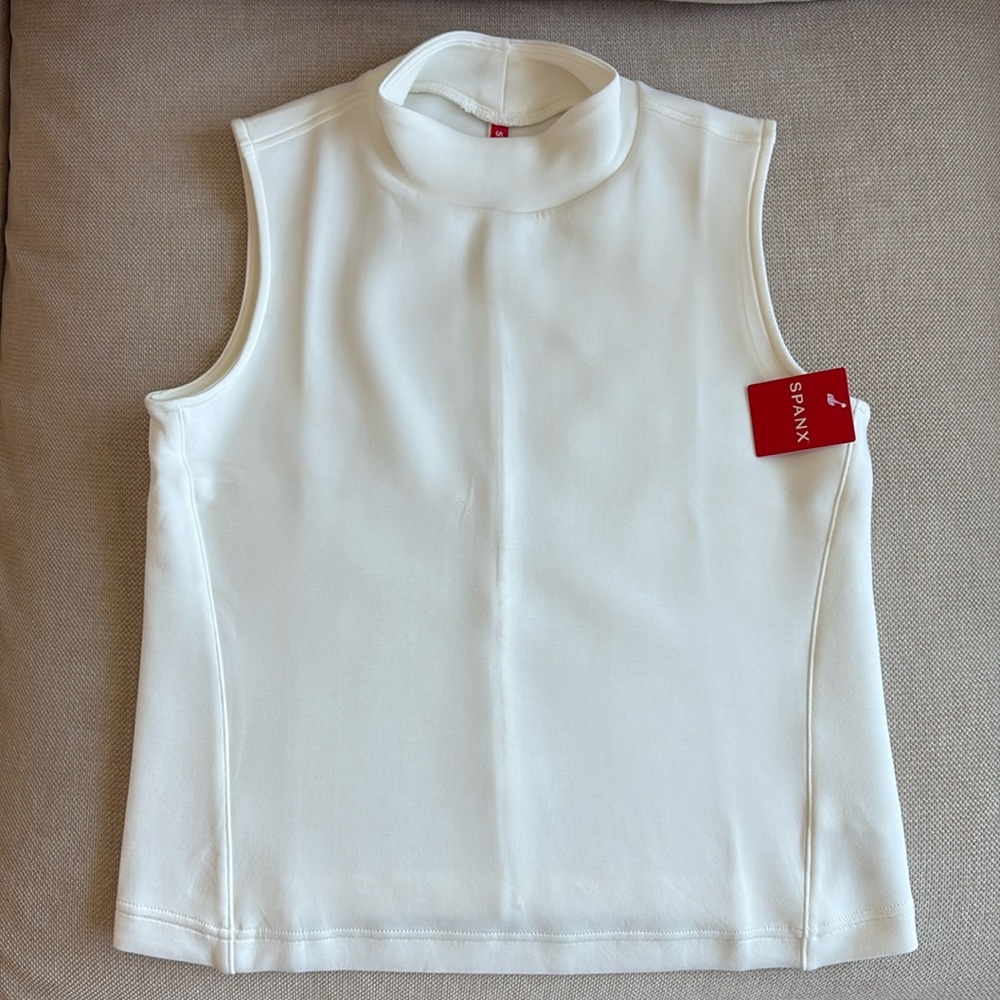 White turtle neck top
